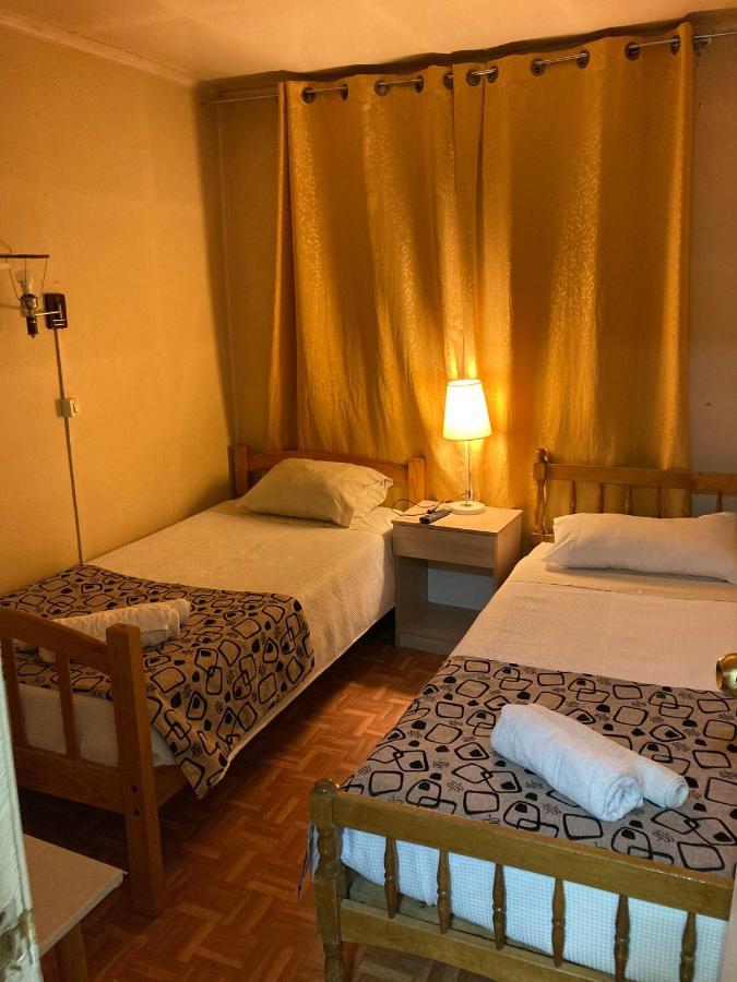Hostal Hellen Пуэрто-Наталес Экстерьер фото