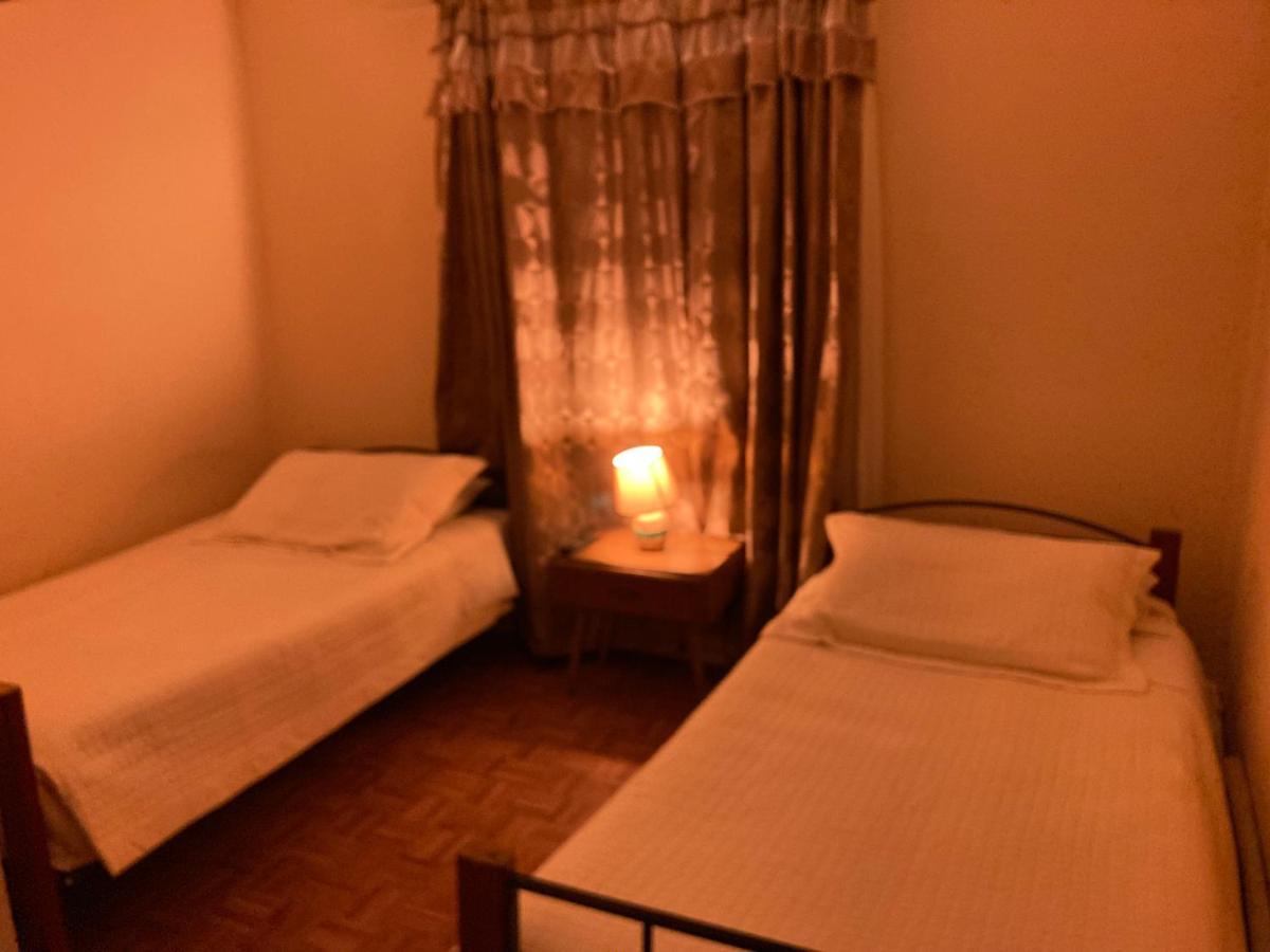 Hostal Hellen Пуэрто-Наталес Экстерьер фото