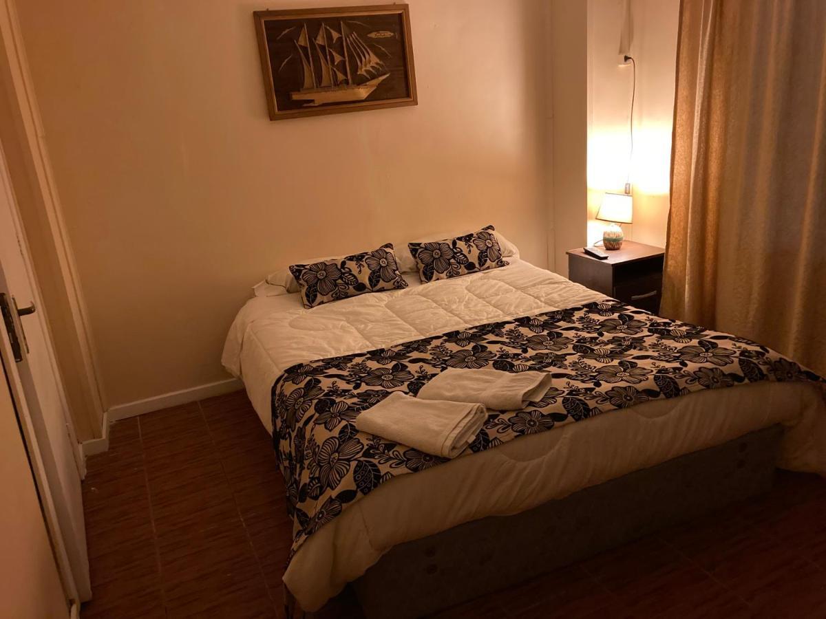 Hostal Hellen Пуэрто-Наталес Экстерьер фото